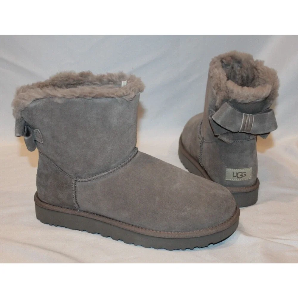 NIB UGG WOMEN'S CLASSIC BAILEY BOW HERITAGE SUEDE SHEARLING BOW BOOTS‎ GRAY
